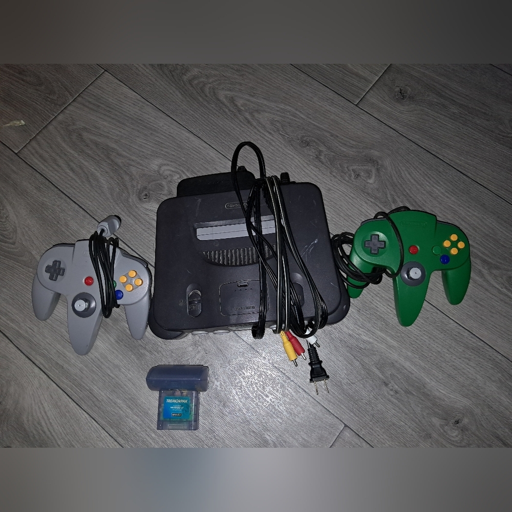 Nintendo 64 Console with Gray and Green Controllers